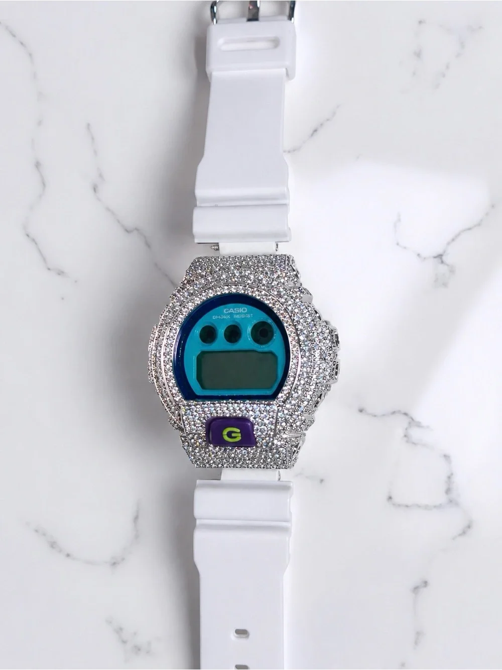 G-Shock White Watch with Silver Crystal-Encrusted Bezel and Blue Display